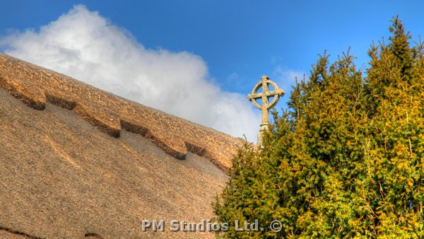 Cross on the roof of the church
